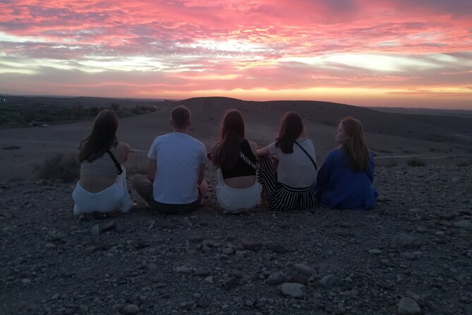 Agafay Desert sunset Dinner & Fire Show - from Marrakech - Sunset over rocky hills, not Sahara dunes