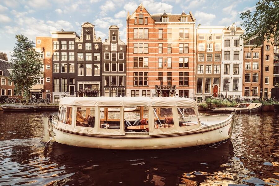 Amsterdam: Private Romantic Evening Boat Tour with Prosecco - Prosecco, Dutch cheese, and a blanket
