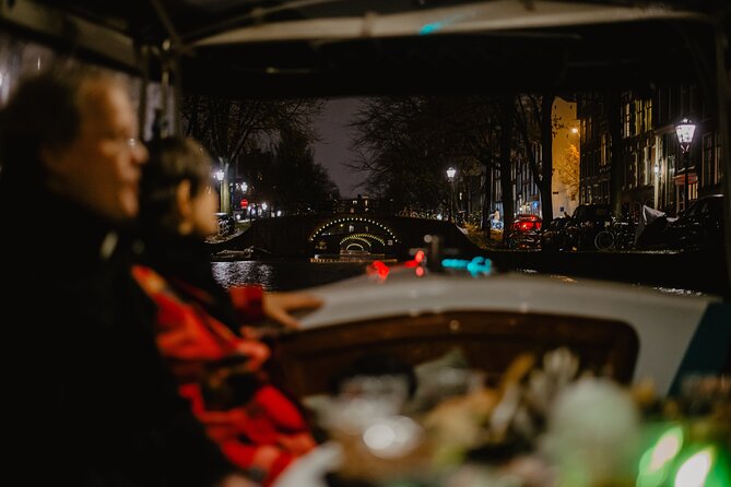 Amsterdam: Private Romantic Evening Canal Cruise + Bubbles/Snacks - From the Flower Market to the oldest bridge