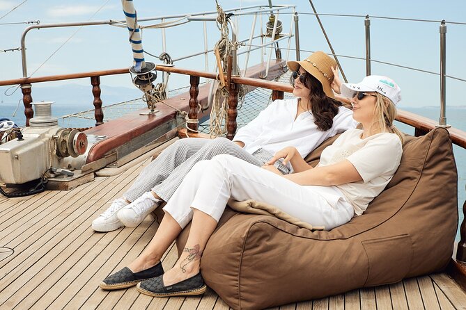 Athens Sunset Dinner Cruise – Swim Stop, Dinner & Open Bar - Glyfada, Ellinikon, Alimos, and Castella from the water