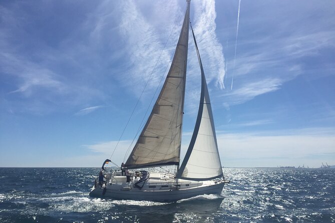Barcelona Private Romantic Sailing Tour - Montjuïc rising above the coast