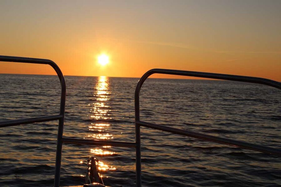 Cavtat: Romantic Sunset Cruise with Unlimited Drinks - Župa Bay at golden hour