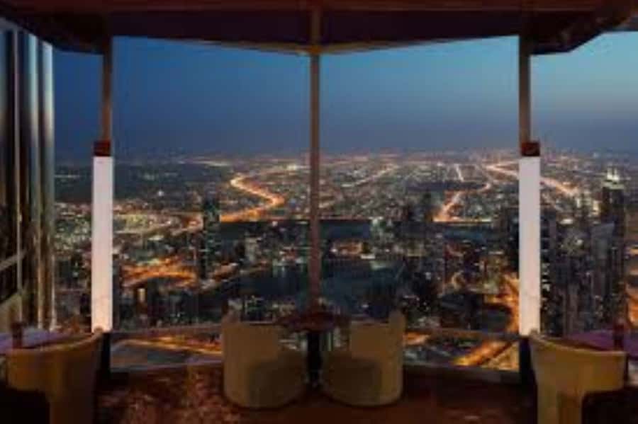 Dubai: Burj Khalifa Sunset Engagement with Porsche Pickup - Champagne, cocktails, and the rose keepsake