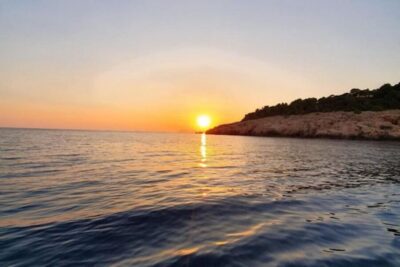 Romantic Sunset Cruise & Cave Visit with a Local