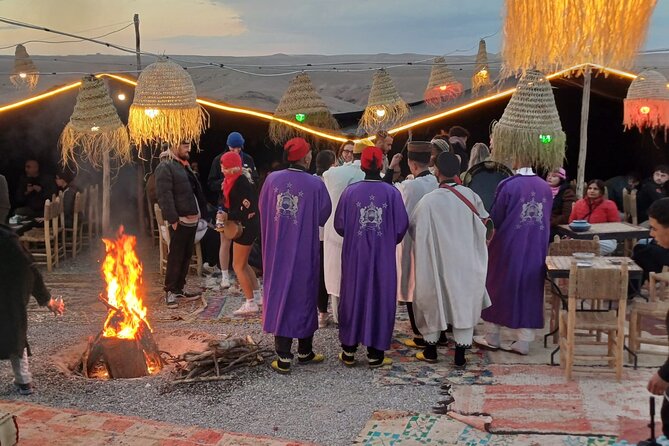 From Marrakech: Quad sunset dinner Experience & show - Tea, a bonfire, and Moroccan dinner at camp