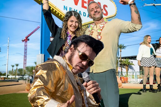 Gold Elvis Wedding or Vow Renewal at Las Vegas Sign - A live first dance beside the sign