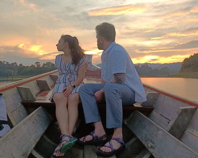Khao Lak: Cheow Lan Lake Romantic Sunset Cruise with Drinks - Swimming in the emerald-green water
