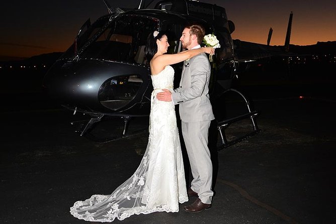 Las Vegas Night Flight Helicopter Wedding Ceremony - A wedding ceremony with the Las Vegas lights below