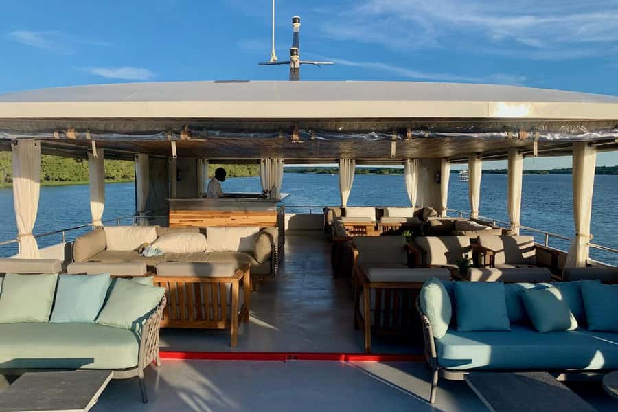 Luxury Sunset Dinner Cruise with 4-Course Meal - Sunset views with Victoria Falls in the distance