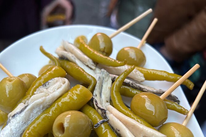 Madrid Local Tapas Tour with Private Dinner and Bottomless Wine - Key details of the Madrid tapas evening