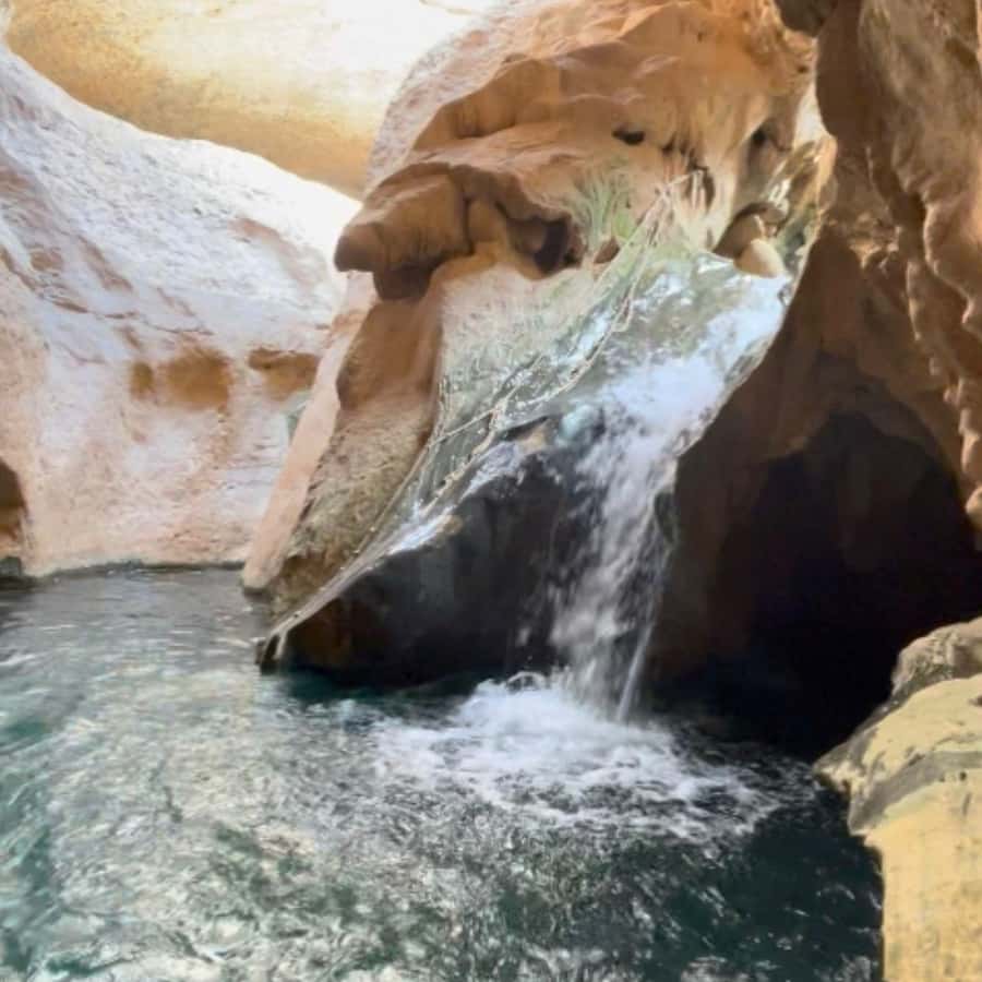 Muscat: Wadi Shab, Romantic Cave and Sinkhole Full-day Trip - Swimming through the pools and waterfall cave
