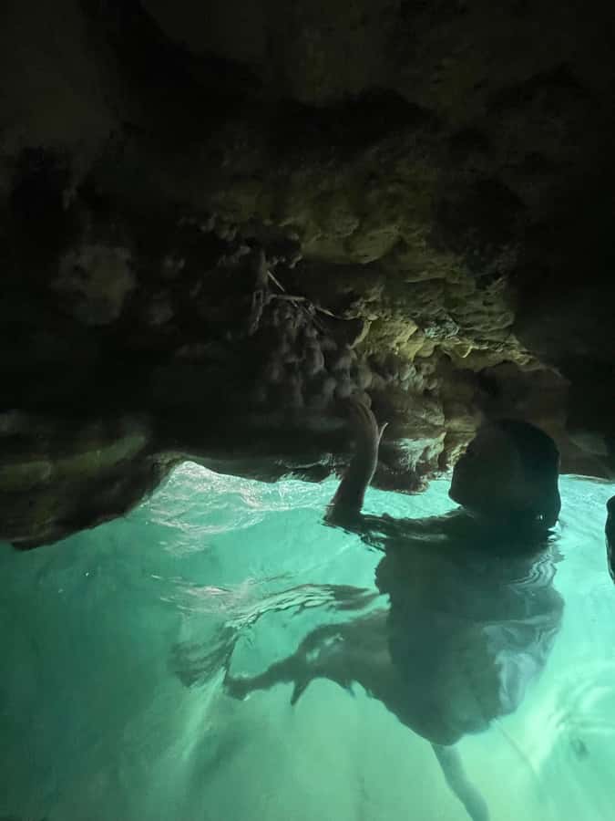 Muscat: Wadi Shab, Romantic Cave and Sinkhole Full-day Trip - Crossing the water to Wadi Shab