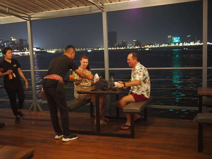 Phnom Penh: Mekong Sunset Dinner Cruise with Live Music - Dinner from a stainless-steel kitchen