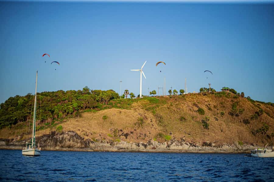 Phuket: Coral Island Day Trip and Sunset Dinner by Catamaran - Dinner with Promthep Cape in view
