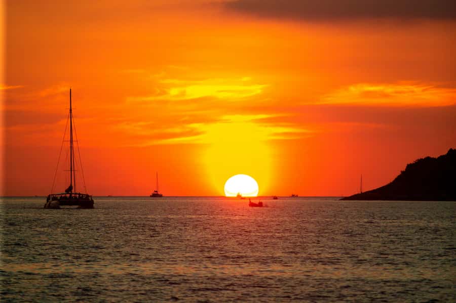 Phuket: Coral Island Day Trip and Sunset Dinner by Catamaran - Kahung Beach and the long island stop