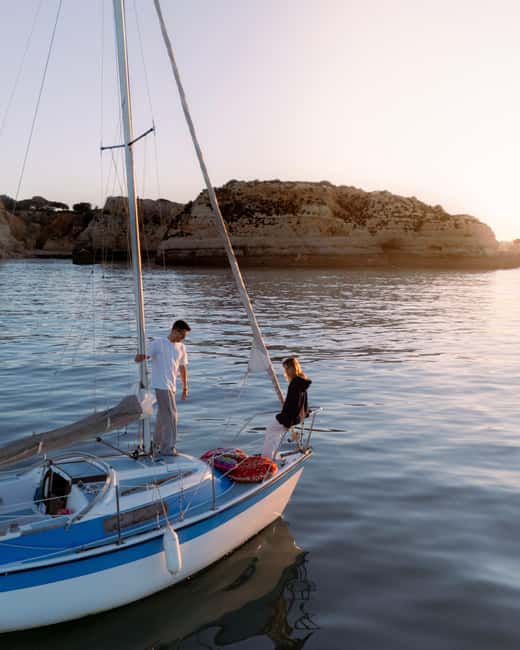 Portimão: Sunset Private Sailing Tour for Couples - Boarding the boat in Ferragudo
