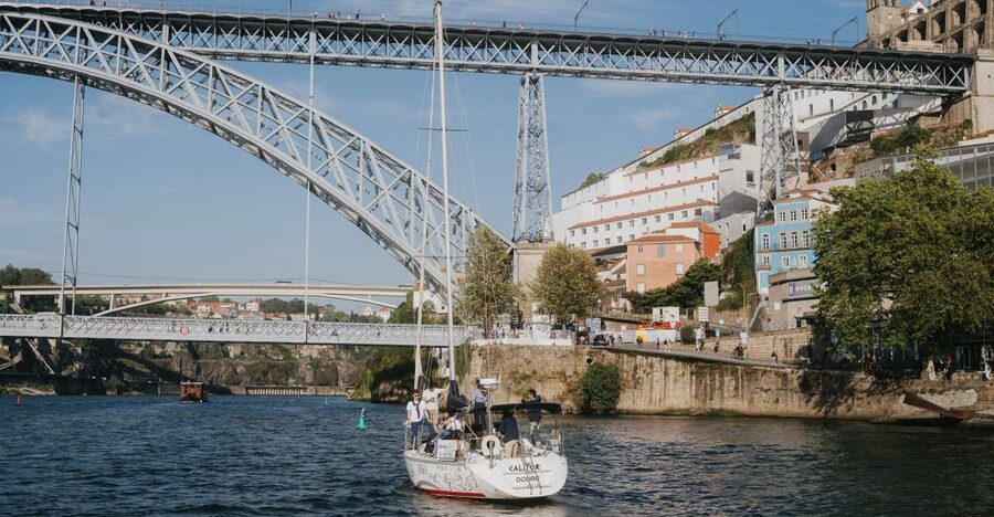 Porto: Romantic Sailboat Cruise - Passing beneath the Arrábida Bridge