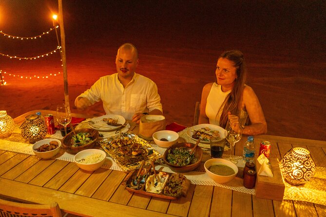 Private Dinner in the dunes in the Mleiha National Park - A campfire before the private Arabic dinner