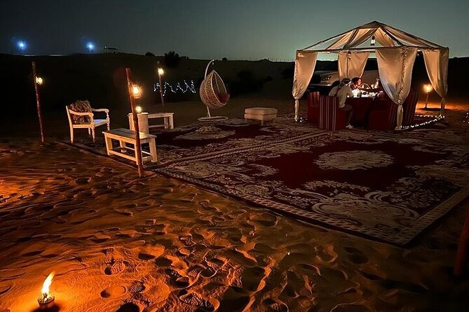 Private Dinner in the Heart of the Desert with Entertainment show - Sand boarding and the short camel ride