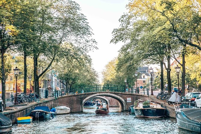 Private Romantic Canal Cruise Amsterdam with Bubbly and Snacks - The Seven Bridges and the open water of the Amstel