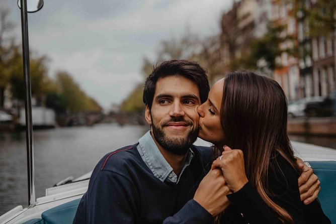 Private Romantic Canal Cruise Amsterdam with Bubbly and Snacks - Houseboats, the Skinny Bridge, and the city’s love stories