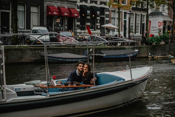 Private Romantic Canal Cruise Amsterdam with Bubbly and Snacks - A medieval tower and a very short canal