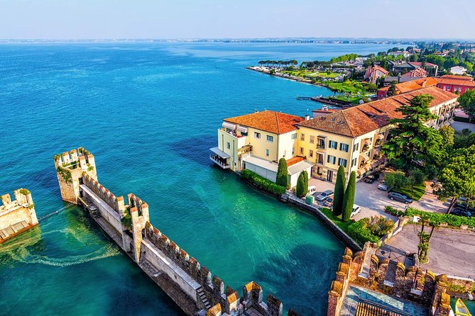 Private Romantic Motorboat Tour From Sirmione - The Desenzano shoreline in the first 30 minutes