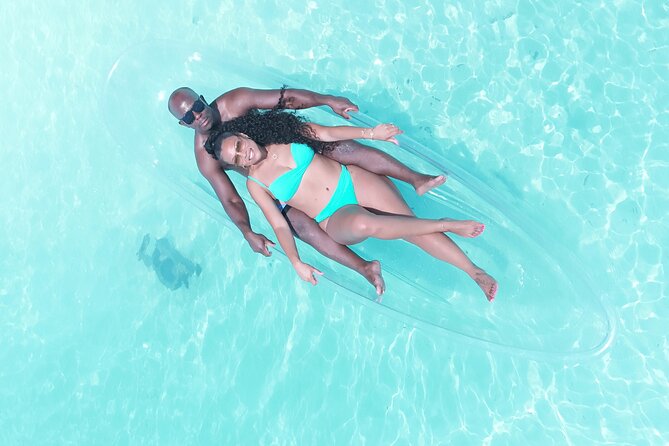 Romantic Clear Kayak Drone Photoshoot for Couples Turks & Caicos - Sitting above the clear water in Providenciales