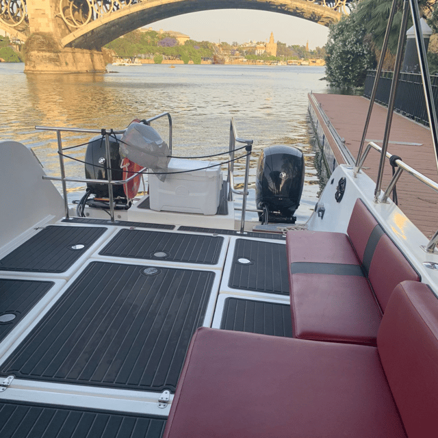 Sevilla: Romantic Boat Ride - Meeting the boat at Puente de S. Telmo