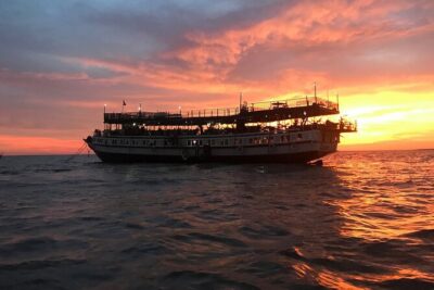 Sunset Dinner and drinks includes a Floating Village cruise tour.