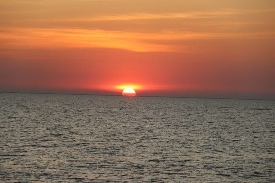Sunset Dinner Tour: Tonle Sap Lake Floating Village - Cruising through the floating village