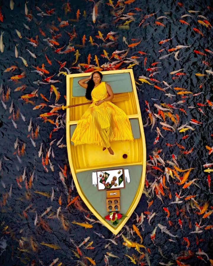 Ubud: The Original Koi Fish Yellow Boat Photo Moment - Arriving at Kamandalu Ubud