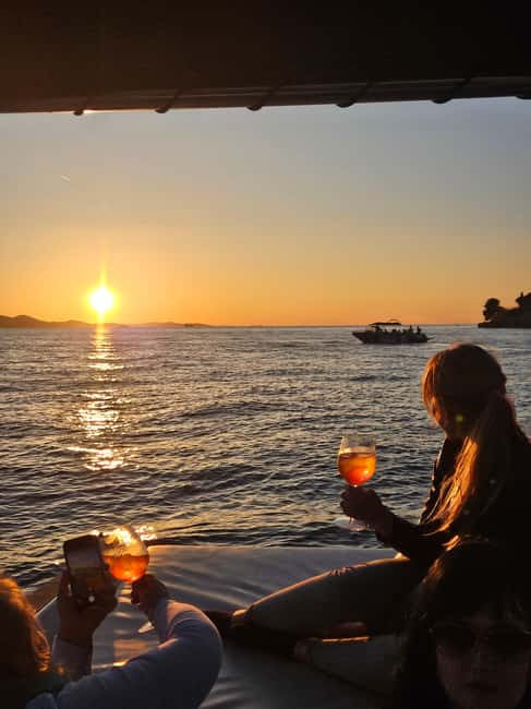 Zadar: Romantic Luxury Sunset Boat Tour with Aperol Spritz - Aperol Spritz, Prosecco, and music on board
